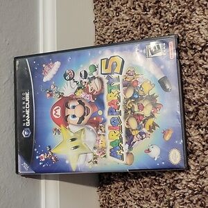 Nintendo gamecube case and manual for Mario Party 5. NO GAME is inside.